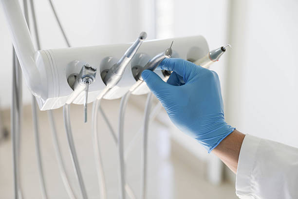 Professional Tooth Extraction technician working in Iowa, LA